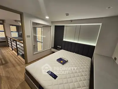 Modern bedroom with stylish design and ample natural light