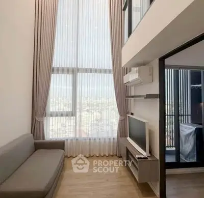 Modern living room with high ceiling and balcony view in luxury apartment