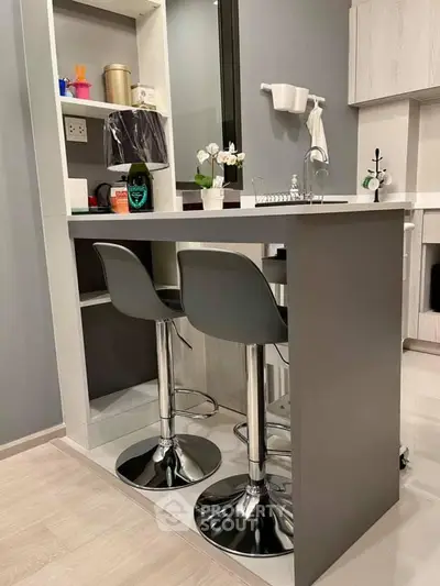 Modern kitchen with sleek bar stools and stylish decor
