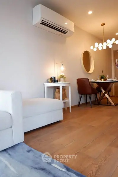 Modern living room with stylish furniture and elegant lighting