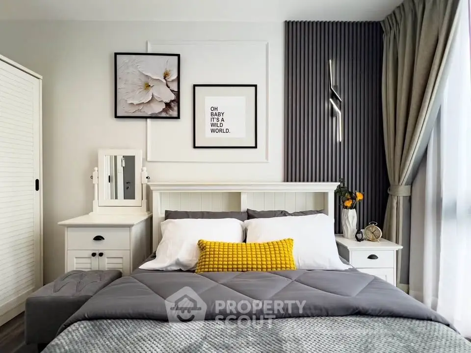 Stylish bedroom with modern decor, featuring a cozy bed, elegant wall art, and soft lighting for a serene ambiance.