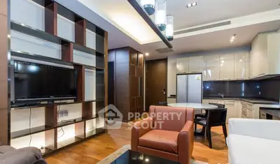 Modern living room with open kitchen and stylish furniture