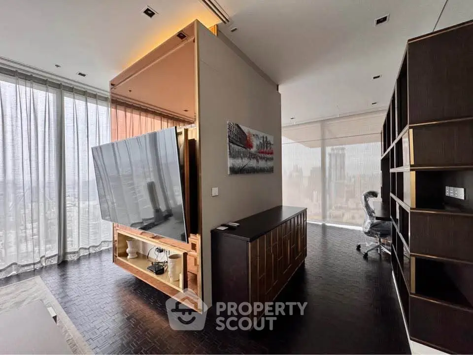 Luxurious modern living room with panoramic city views and sleek design elements.