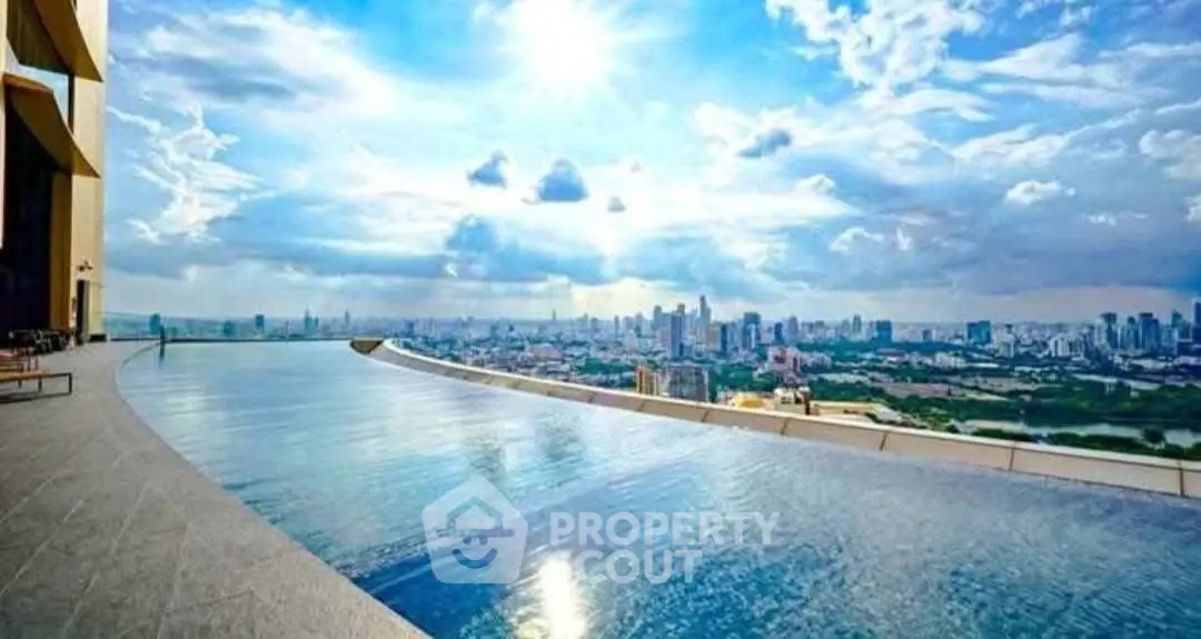 Stunning rooftop infinity pool with breathtaking city skyline view