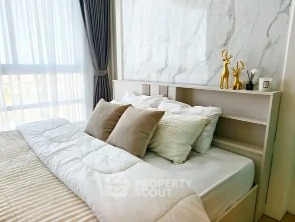 Luxurious bedroom with elegant decor and natural light