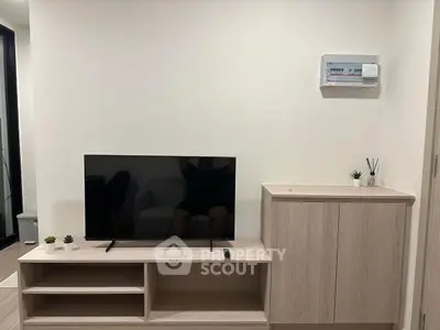 Modern living room with sleek TV stand and minimalist decor