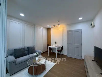 Modern living room with cozy sofa and elegant dining area