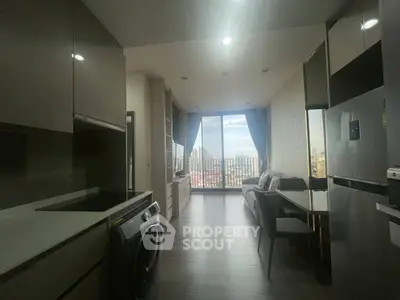 Modern apartment with city view, open kitchen, and cozy living area