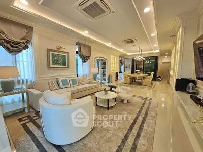 Luxurious living room with elegant decor and spacious dining area