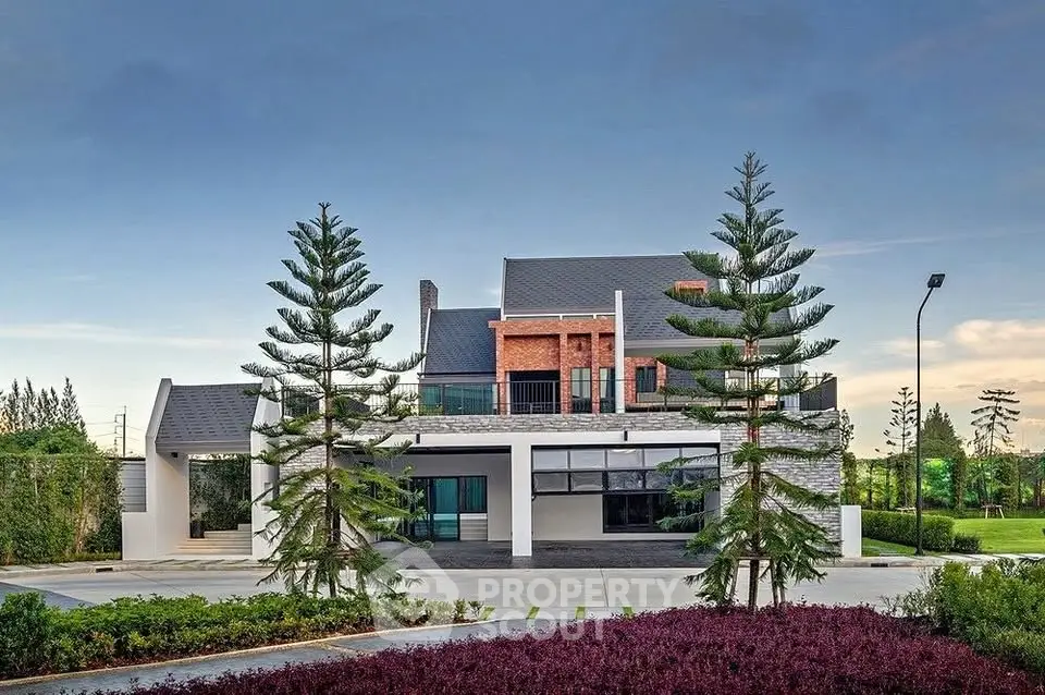 Stunning modern house with lush landscaping and unique architectural design