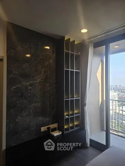 Modern apartment interior with sleek marble wall and city view balcony