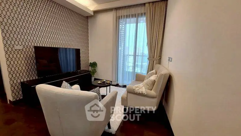 Elegant living room with modern decor and large window view