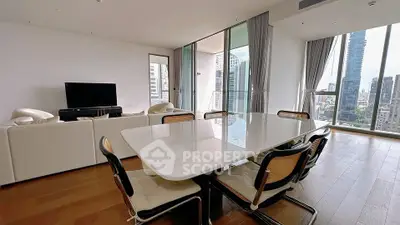 Spacious modern living room with city view and elegant dining area