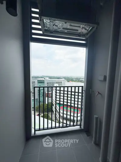 Modern balcony with city view in high-rise apartment