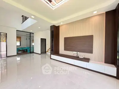 Spacious modern living room with sleek design and ample natural light