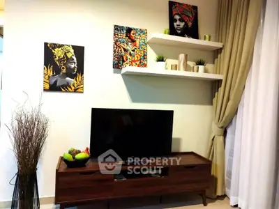 Stylish living room with modern TV stand and vibrant artwork