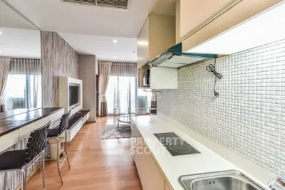 Spacious modern kitchen with open layout and stylish living area