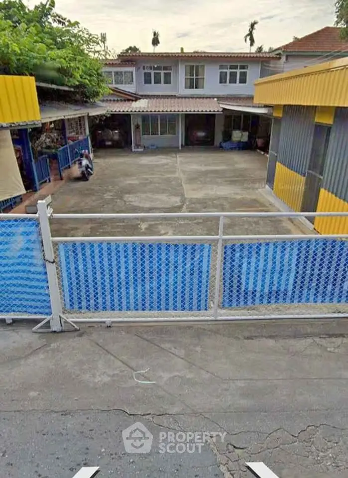 Spacious residential property with ample parking and secure fencing