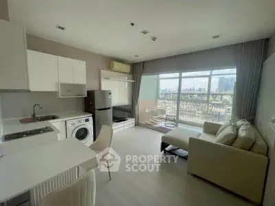 Modern open-plan living room with city view, featuring sleek kitchen and cozy seating area.