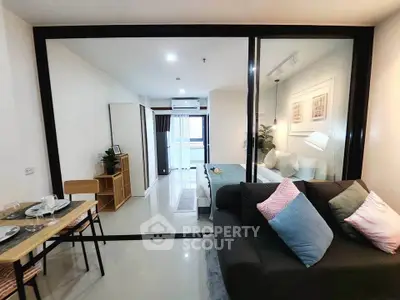 Modern open-plan living room with stylish decor and cozy ambiance