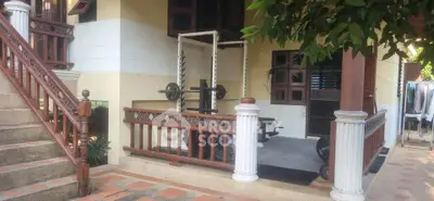 Charming home exterior with outdoor gym and classic wooden staircase