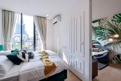 Chic bedroom with large windows and stylish decor in a modern apartment