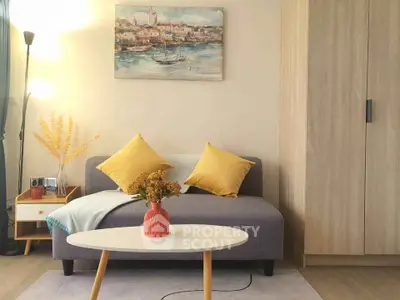 Cozy living room with stylish sofa, vibrant cushions, and elegant decor