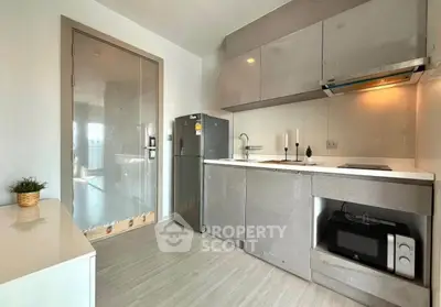 Modern kitchen with sleek cabinets and stainless steel appliances