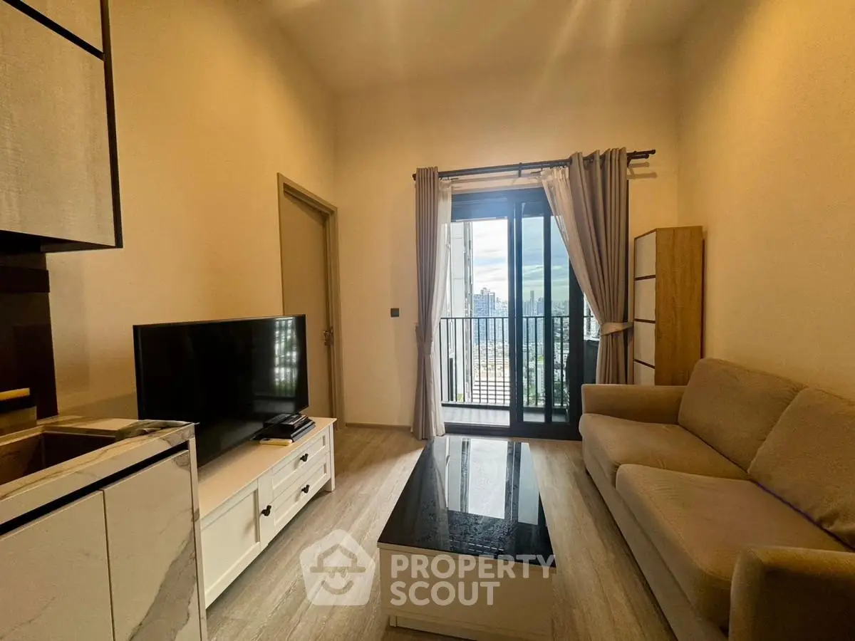 Modern living room with balcony view and stylish furniture