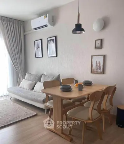Modern living room with cozy dining area and stylish decor