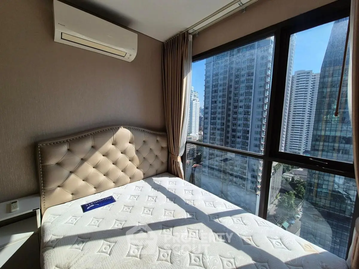 Luxurious bedroom with stunning city view and elegant decor