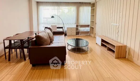 Spacious living room with modern furniture and natural light