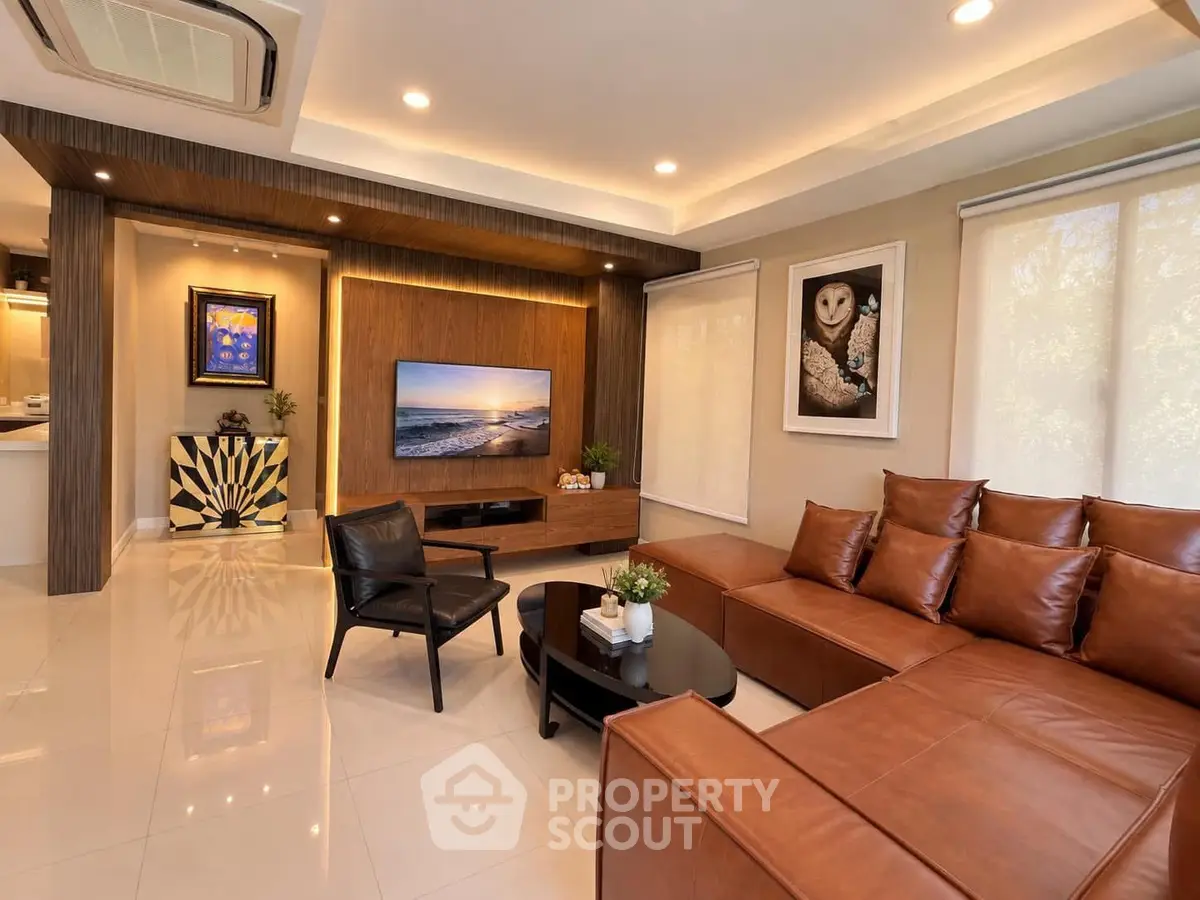 Luxurious modern living room with leather sofa and stylish decor