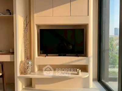 Modern living room with built-in TV unit and large window view