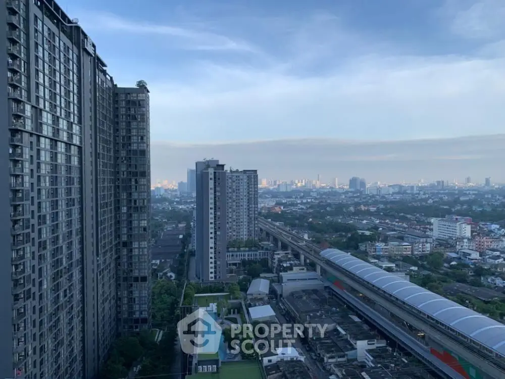 Stunning cityscape view from high-rise building with expansive skyline and urban landscape.