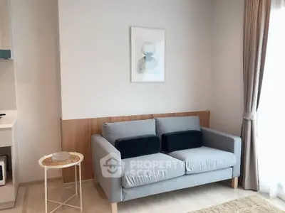 Modern living room with stylish gray sofa and elegant decor