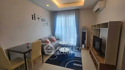 Modern living room with cozy furniture and natural light