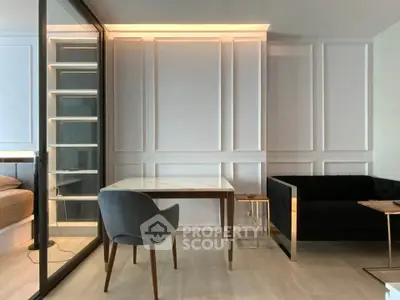 Modern living room with elegant paneling and stylish furniture