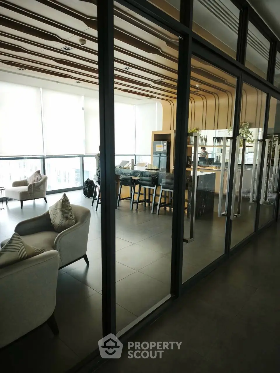 Modern shared co-working space with stylish seating and natural light
