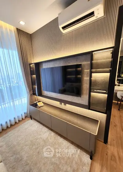 Modern living room with sleek TV unit and ambient lighting