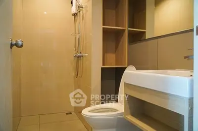 Modern bathroom with sleek fixtures and wooden shelving, perfect for contemporary living.