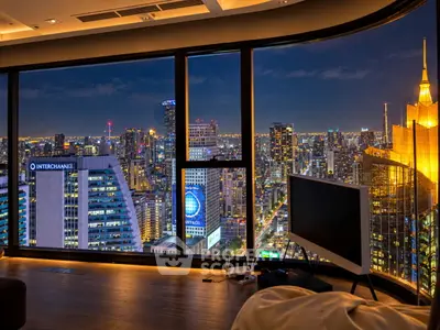 Luxurious living room with stunning city skyline view at night, featuring floor-to-ceiling windows.