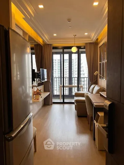 Modern living room with balcony view in high-rise apartment