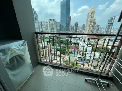 High-rise balcony with city skyline view, perfect for urban living enthusiasts.