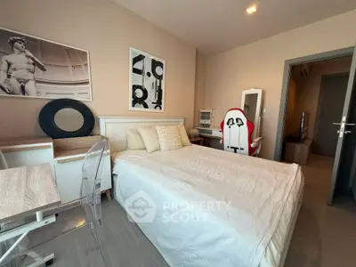 Modern bedroom with stylish decor and gaming chair, perfect for comfort and relaxation.