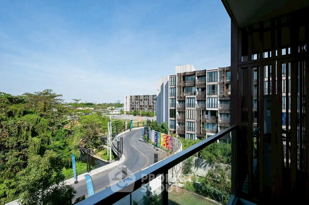 Modern apartment building with scenic view from balcony