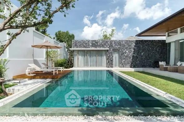 Luxurious villa with stunning private pool and modern architecture.