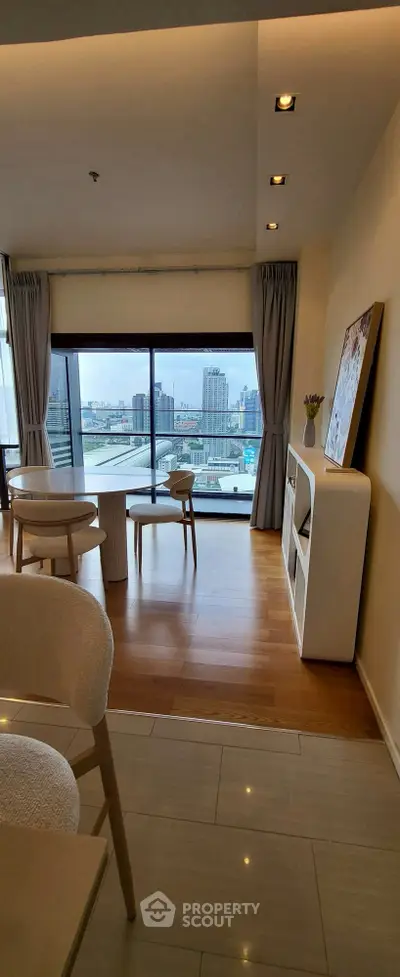 Modern living room with stunning city view and elegant decor