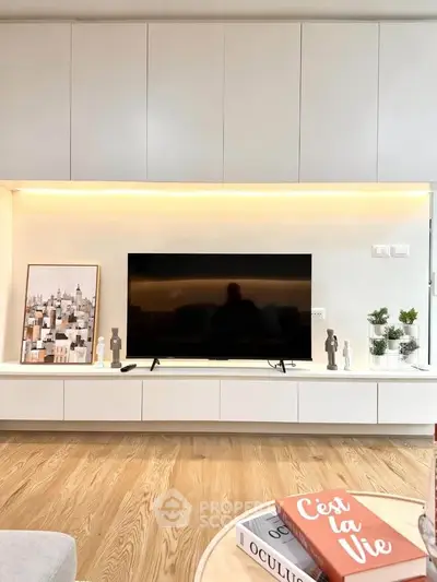 Modern living room with sleek TV unit and stylish decor