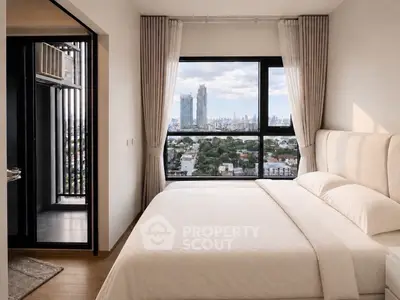Luxurious bedroom with stunning city view and elegant decor